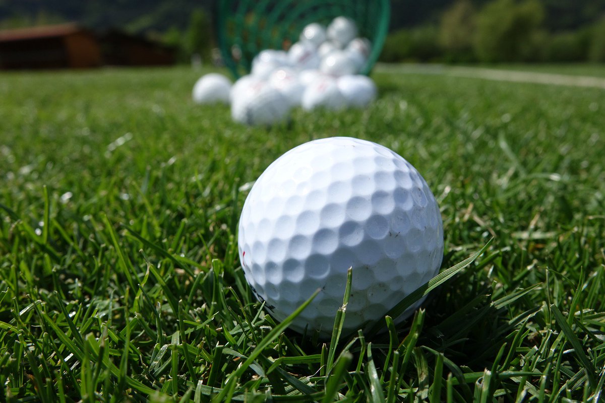 WHY DO GOLF BALLS HAVE DIMPLES?